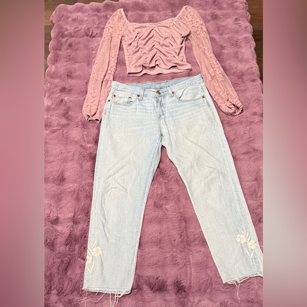 Levi’s light blue jeans with lavender purple feminine blouse